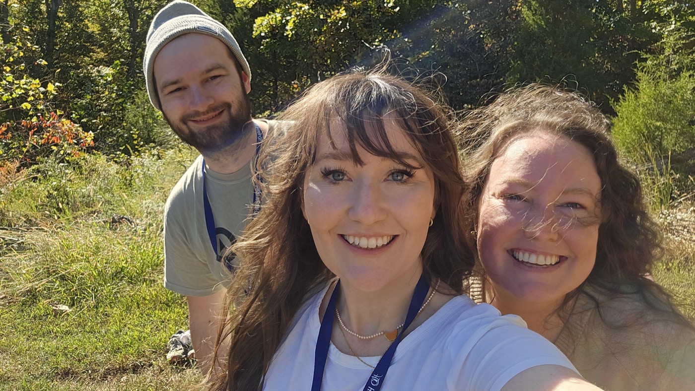 Three friends on a sunny trail at HopeCon