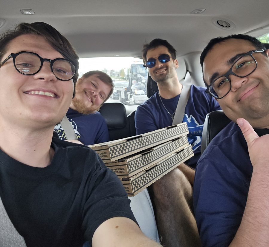 Four friends in the car together on the drive to HopeCon
